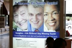 Dentist office sign in Clearwater Mall, Florida - elderly woman
